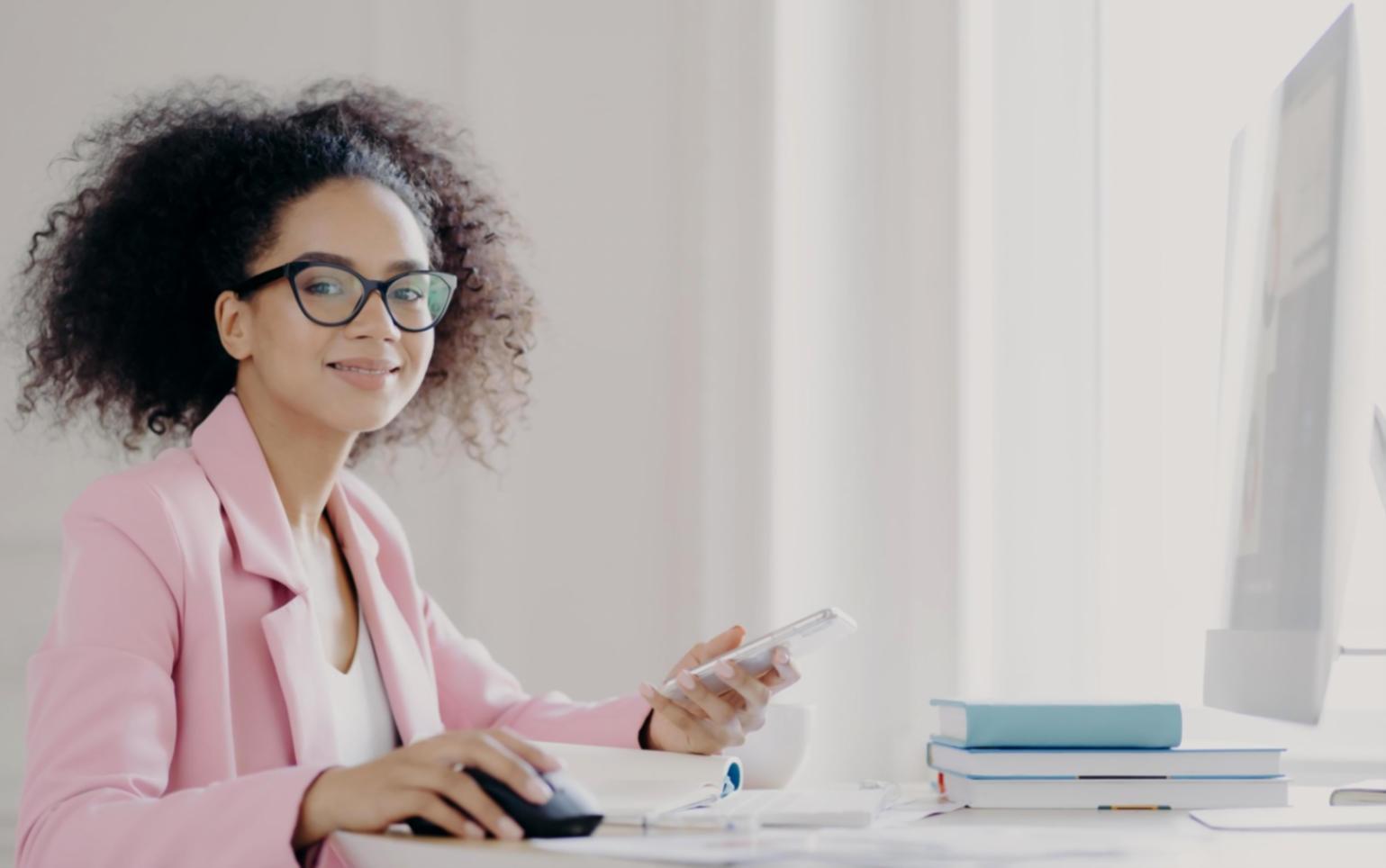 Instructor demonstrating budget communication techniques with workshop materials