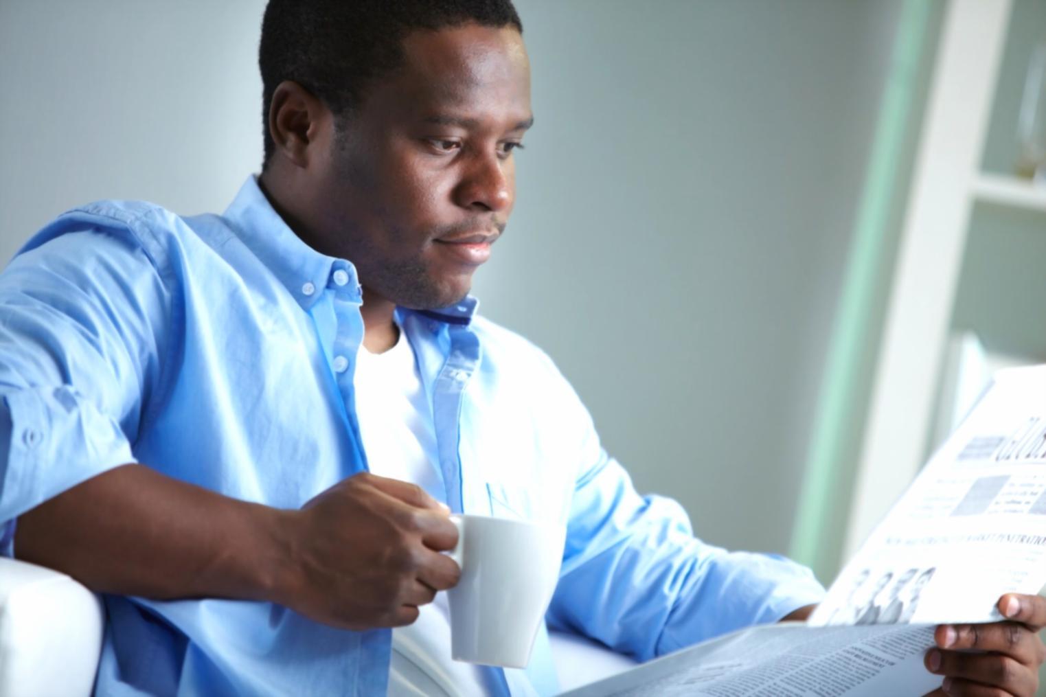 Modern workspace with financial planning documents and digital tools